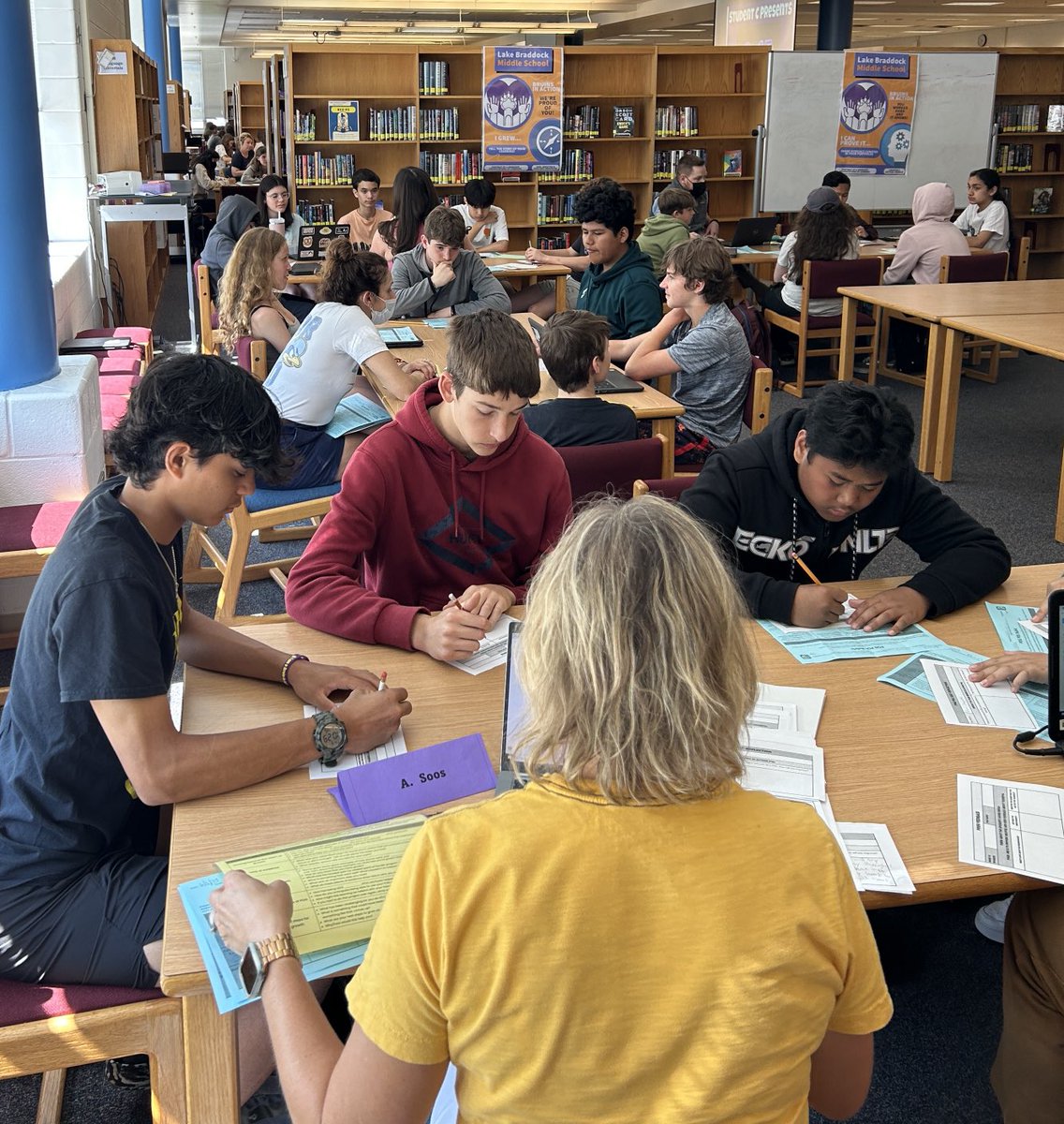 Lake Braddock 8th graders sharing their culminating Bruins in Action Presentations of Learning. What an amazing morning.  83 students; 23 facilitators (thank you); 3 classrooms in the library; all the joyful mummur of student-discourse!  #fcps_ic
<a href="/LBSS_Library/">LBSS Library</a>
⁦<a href="/FCPSLBSS/">Lake Braddock SS</a>⁩