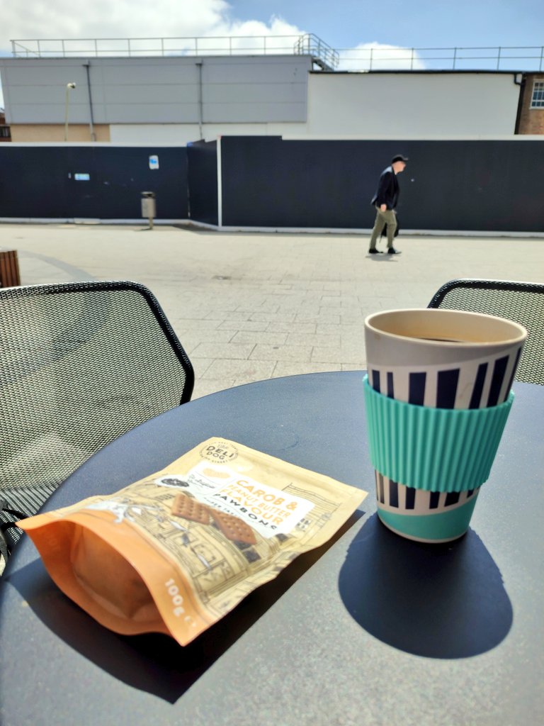 Firesnapper999's tweet photo. Late @StarbucksUK today, #DecaffResus in the sun. Even if parts of #Farnborough looks like a boarded up bomb site. https://t.co/QhsjXtGAXp