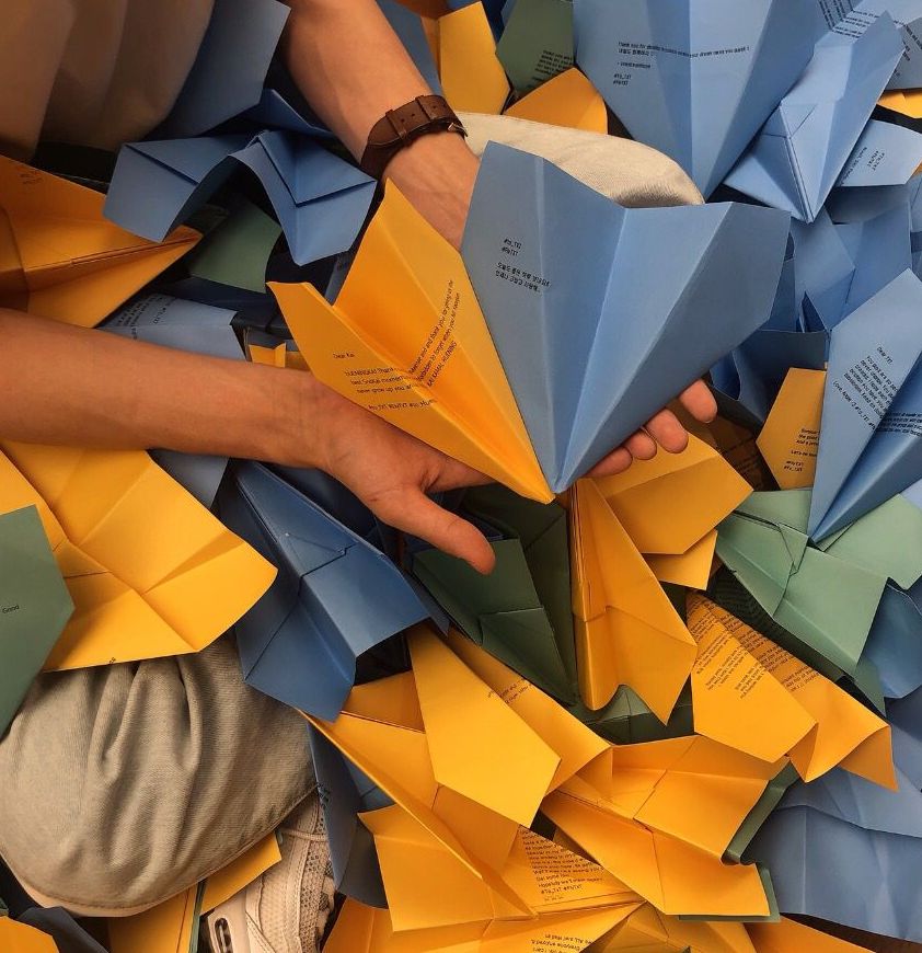 txtdcm's tweet photo. 5. There was an event called #FlyTXT where weverse provided a special place where we can write letters to txt which then were printed and folded into paper planes to be put inside this installation https://t.co/jOOqx5qQU1