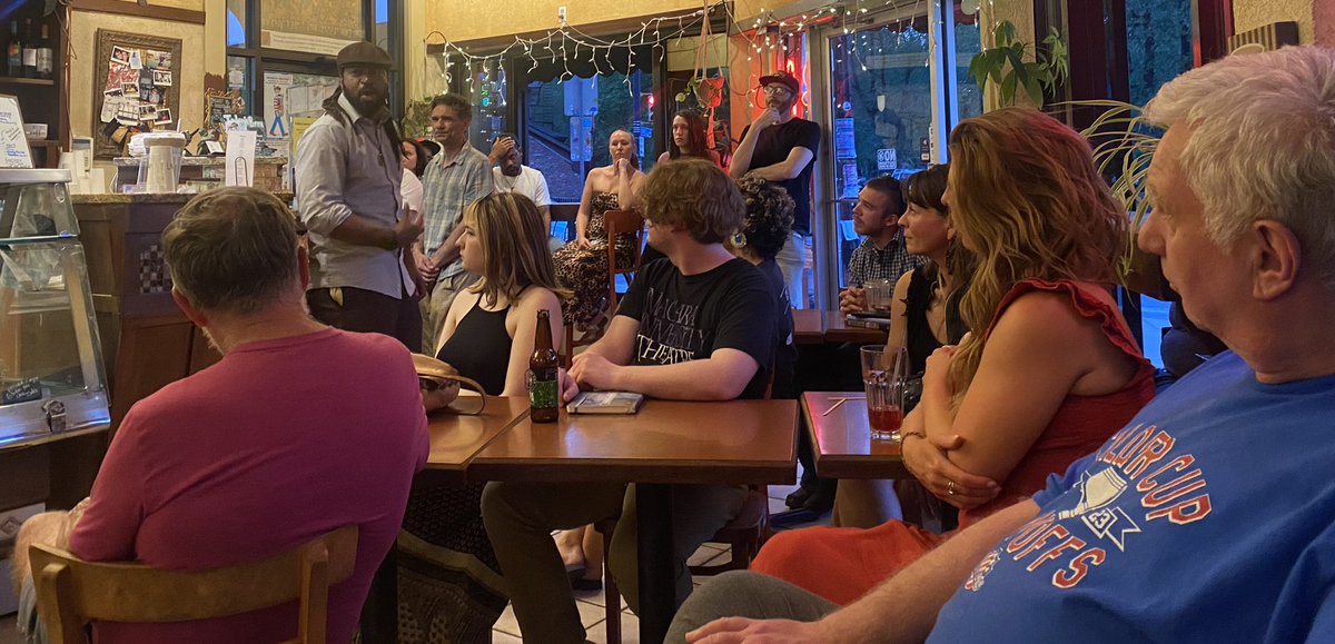 justin_karcher's tweet photo. Last night was wild. We had poets everywhere. They were reading poems through open windows &amp; climbing over chairs. The vibe was good, the air was hot, there were tears of sadness &amp; tears of joy. Big thx to @Pureinkpoetry for featuring. We’re back again in two weeks. Love you all https://t.co/i0Xsl3VjwR