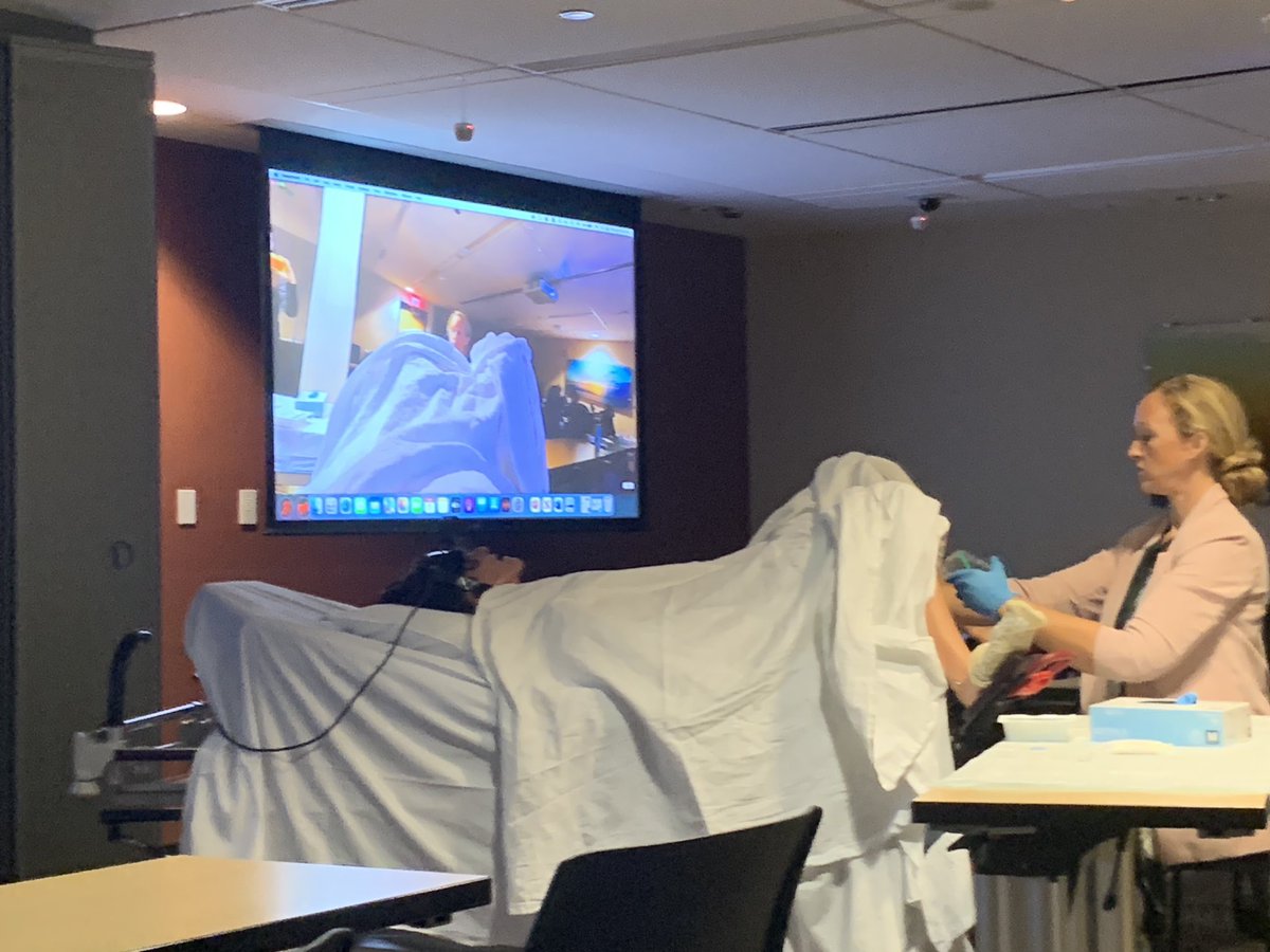 ⁦@marymclean85⁩ teaching the residents about a pelvic exams from the patient’s perspective with a trauma informed approach using a standardized patient. Great lecture showing the other side. Great tips and questions. (Sim model)