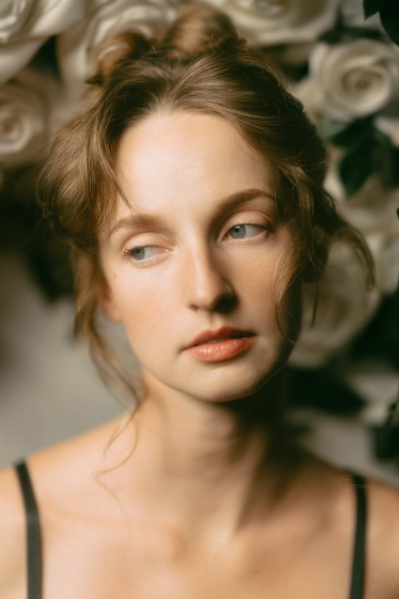 I used the photoshop ai to put the white roses behind her. I think it makes it look more like a painting 😭