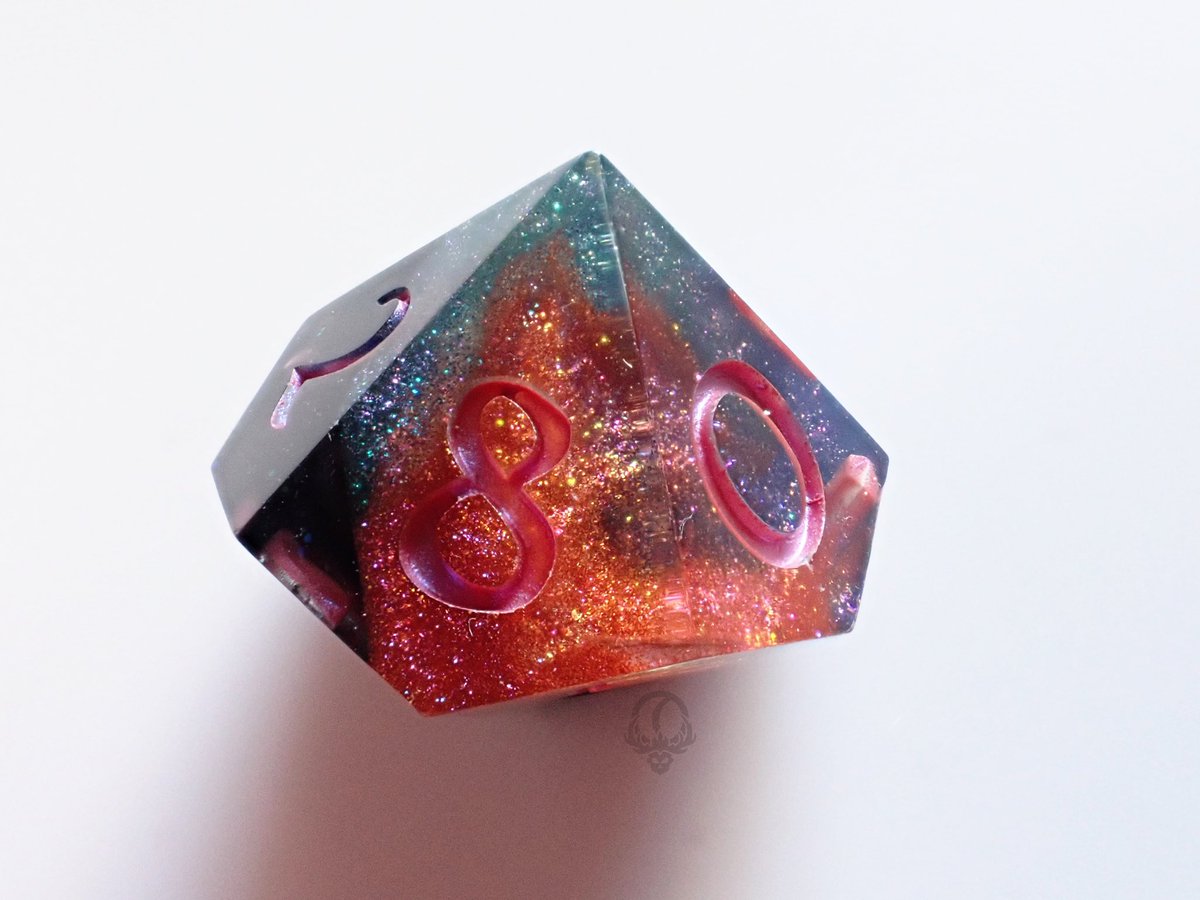 Ultraviolet Cosmos 🌌 

Metallic pink ink accents a glittery backdrop, nestled into a black abyss peppered with subtle glitter. ❤️ 💀 

#dice #handmadedice #d20 #dnd #dnd5e #dicemaker #dungeonsanddragons #ttrpg #tabletopgaming #polyhedraldice #clickclacks #pathfinder #tabletop