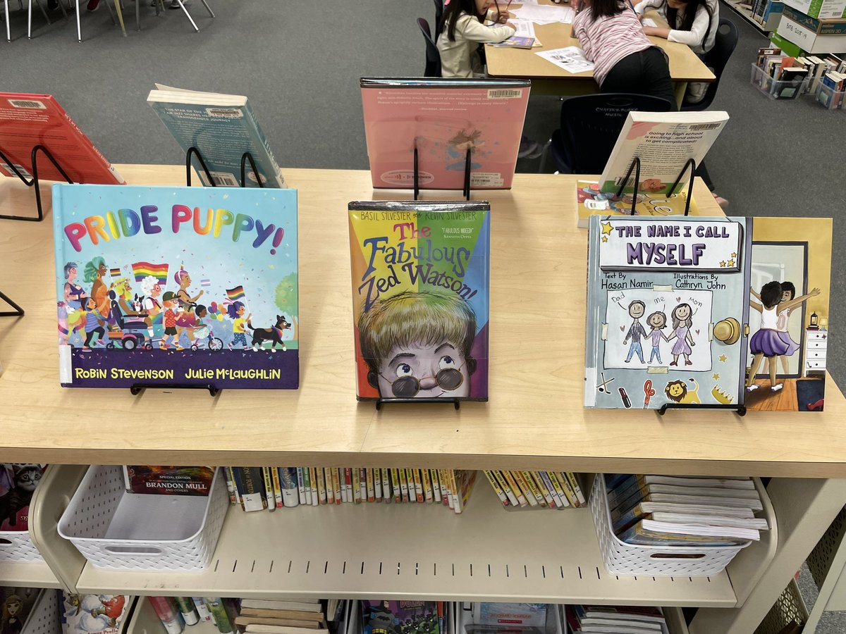 MsZmukic's tweet photo. Happy PRIDE Month! 🏳️‍🌈 This months display celebrates LGBTQ2+ authors and characters. #pridereading @burnabyschools https://t.co/YeO9mzz5YT