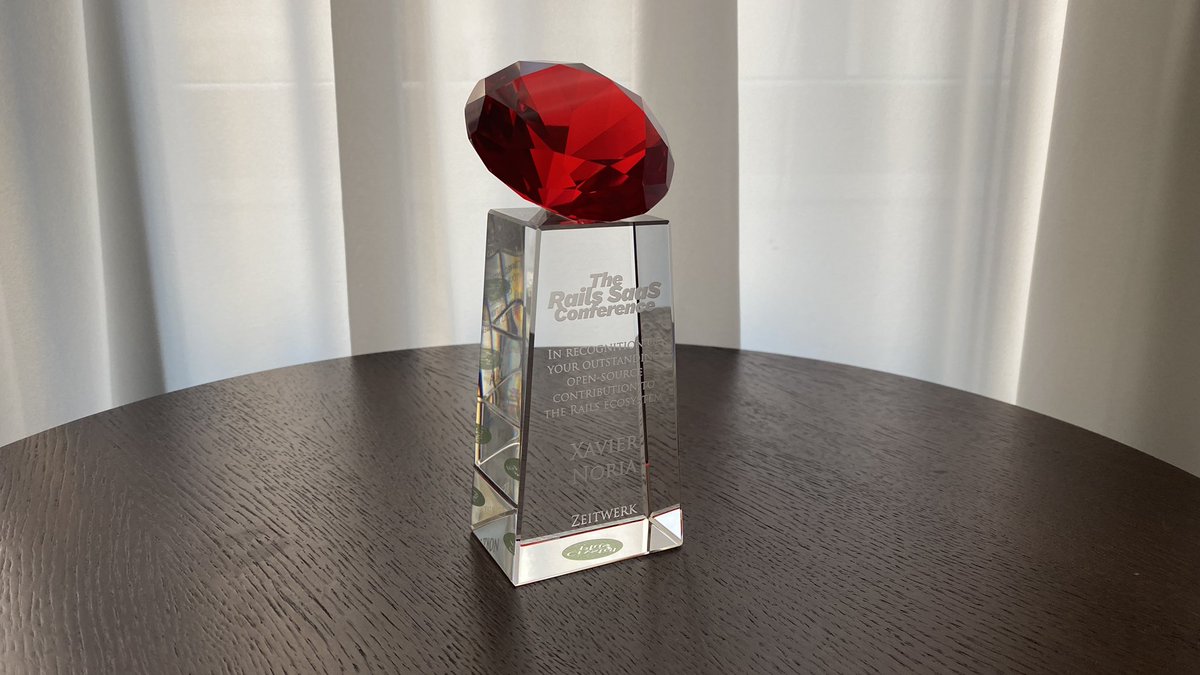 fxn's tweet image. So, this was an incredibly classy and touching surprise @RailsSaaS had prepared. I am so honored.
The award is solid crystal, including the ruby on top. It weights, it reflects light beautifully, and it is really gorgeous.
It'll have a place in my living room.
❤️