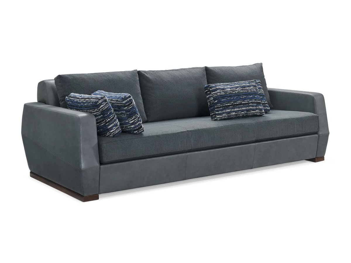 purcell_design's tweet photo. Make a statement with the elegant and dynamic Klippen sofa. The soft radiuses and faceted surfaces pay homage to its geological namesake, while the casual loose seated design features three back cushions and chamfered arm details. https://t.co/xzG0oUpZcP