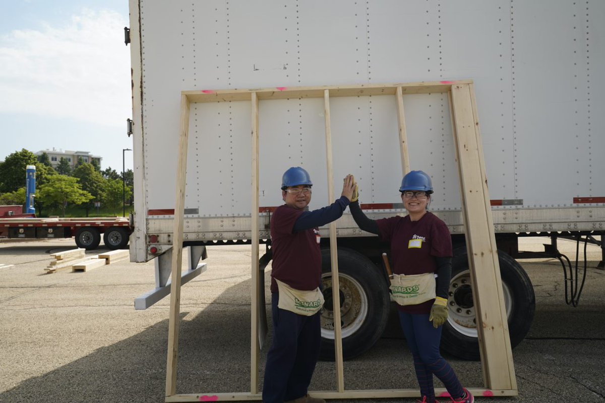 Yesterday more than 100 volunteers from @AmFam rolled up their sleeves to frame an entire @HabitatDane home in the company's NHQ parking lot. AmFam volunteers, along with the future homeowners, built all of the interior and exterior walls for the four-bedroom, two-bathroom house.