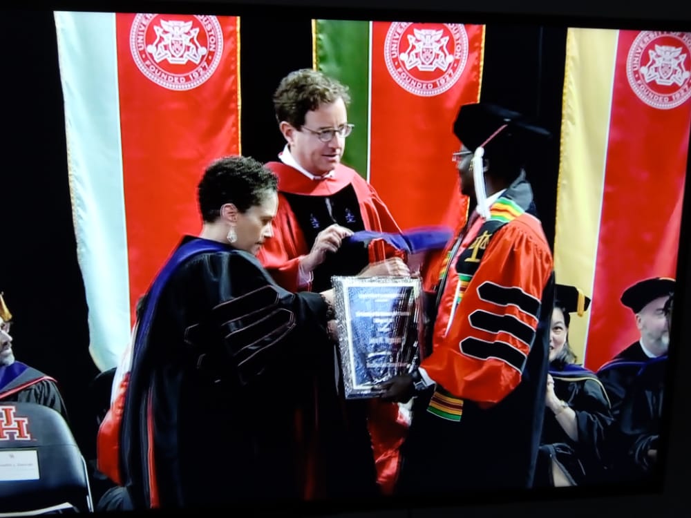 UHLAW's tweet photo. 📸 🎉 Thank you, John Ngunjiri, for sharing your amazing #TBT graduation photos!  It's incredible to see your memories of #HoustonLaw. 

#TBTmemories #HoustonLawAlumni #AlumniPride #LawSchoolMemories #ForeverHoustonLaw #CoCoogs https://t.co/MOp8s4nZGL