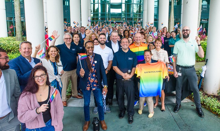 RaymondJames's tweet photo. To celebrate Pride Month, our #RJPride Inclusion Network, #RJPFAN, leaders and associates gathered to raise the Pride flag at our corporate offices in recognition of our LGBTQ+ community and allies. Learn about diversity and inclusion at Raymond James: https://t.co/0w7nD7BBhd https://t.co/a3IIyDNEzZ
