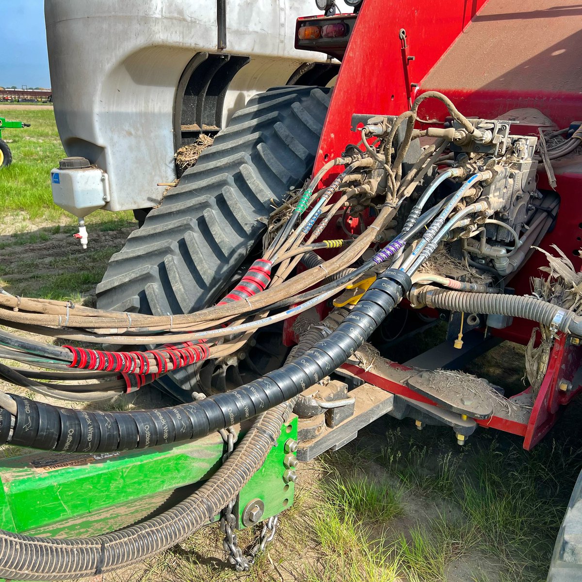 OutbackWrap's tweet photo. Planter fresh off the field loaded with Outback Wrap! Hose Boss, Hose Tamer, 4-Pair, 2-Pair Purple/Grey, and Power Beyond all making hooking up easy in the field!
#makehookingupeasy #outbackwrap #plant23 #hydraulichoselabels https://t.co/wPhyufAibh