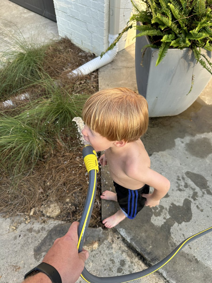 Raise your kids the right way.. outside, no shoes, no shirt, drinking out of a water hose!  #summer