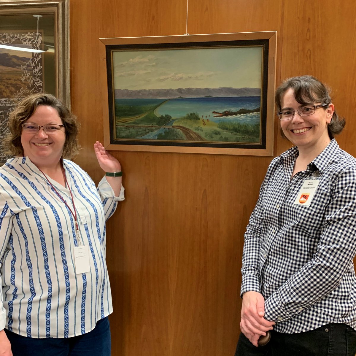 Of course if we're going to mention Bear Lake for #ArchivesUnderTheSea, we have to spotlight the monster! The local legend is captured in a painting at @USULibraries. When our staff was at @USUAggies for the @cimarchivists conference they snapped a photo! 🦕#ArchivesHashtagParty