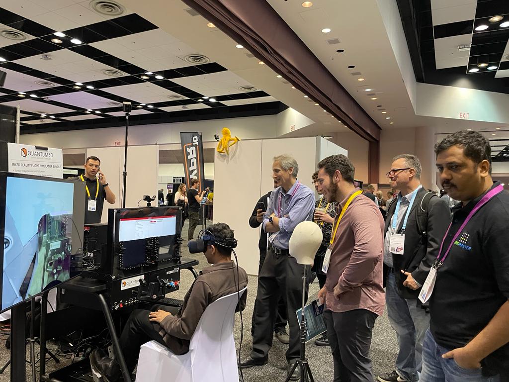 Quantum3D's tweet photo. It has been a long day at #AWE2023 with a lot of visitors. Come to Quantum3D's booth (1047) to try our state-of-the-art, affordable Mixed Reality Flight Simulator powered by MANTIS Image and Sensor generation software.
#Quantum3D #AWE #flightsimulator #simulation #mixedreality https://t.co/XWGrL3hMJr