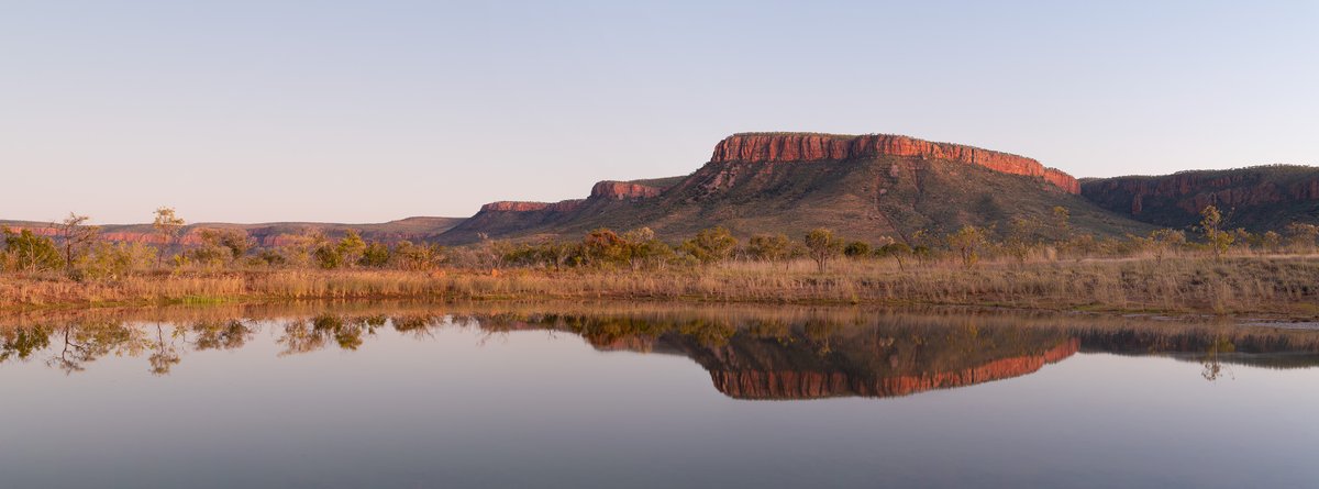 The iconic Cockburn Range is a prominent feature of the Kimberley region in <a href="/WestAustralia/">Western Australia</a>. Best seen at sunrise or sunset when the vertical cliff faces glow in magnificent shades of orange &amp; red.

#thekimberley #westernaustralia #australiasnorthwest #cockburnrange