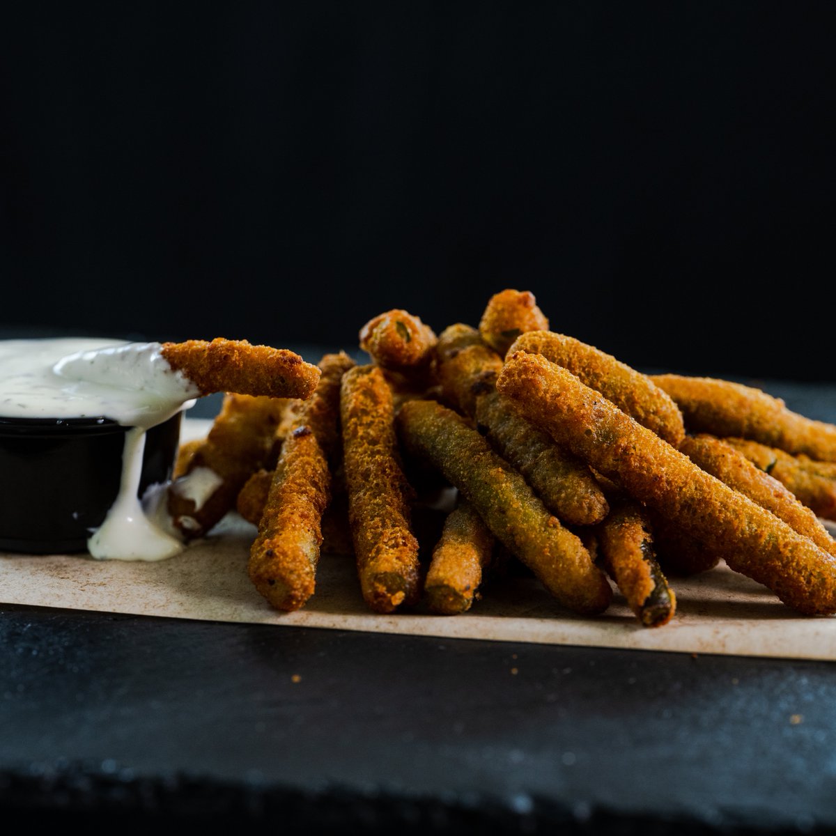 burgerboss's tweet image. Run, don't walk! Our newest menu items are here and the crispy green beans are the crowd favorite. We had an internal bet the mac and cheese bites would win, and we lost. Can't wait to hear what our regulars think! #instoreonly

*Coming soon to delivery, kiosk and in-app orders.