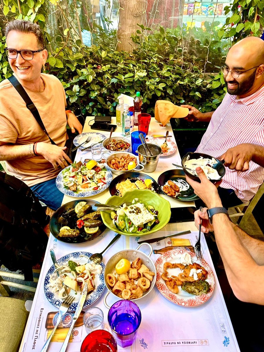 TrinityTakei's tweet image. Greek 🇬🇷 hospitality! 

Petros (@amiridis) from Thessaloniki pulled a MINASWAN during @RailsSaaS Athens by treating us to this dinner (a few dishes, and the dessert are missing from the pic!) and insisted on paying for the whole thing. 🙇

❤️🇬🇷❤️🇬🇷❤️🇬🇷