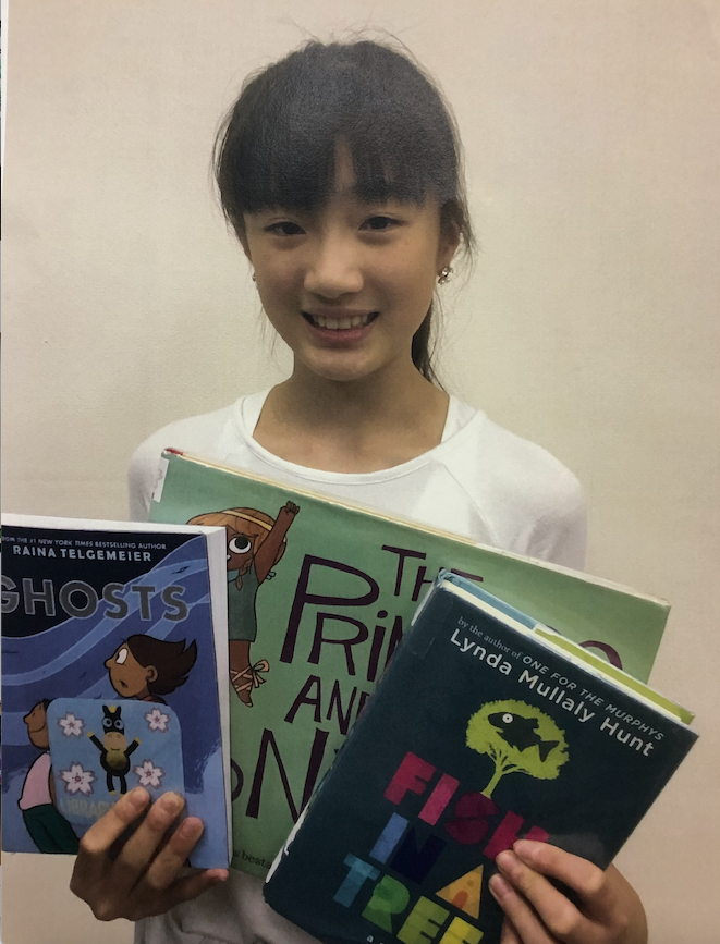 1noisylibrarian's tweet photo. Gr. 10 HS Elementary Library Volunteer recreating her "I Read Them All" 2019 Sakura Medal Books photo. So grateful to have this former student volunteer in the library for the past two years! #sakuramedal #volunteer #esasij #asij #asijesshowcase #mystudentsarethebest https://t.co/yH8aL48BNh