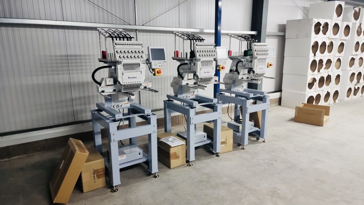 BarudanUK's tweet photo. Twelve BEKT-S1501CAII were delivered and installed this week at @beuniformswt 
All lined up and ready for action! Congratulations guys! Bring on the schoolwear season
#barudan #barufan #barudanforlife #highstandards #exceedexpectations #qualitymatters #builtinJapan #builttolast https://t.co/MNZp941rGf