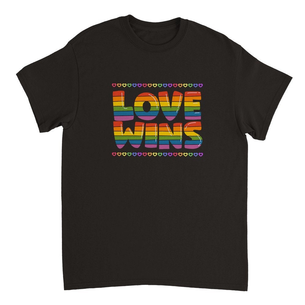 Statement T-Shirt - LOVE WINS - Pride Month
etsy.me/3N8wVRD
#lgbtqpride #pride #prideshirt #lgbtqshirt #pridemonth #lgbtqshirt #statementshirt #lgbtqkleidung #rainbowprint #lgbtq