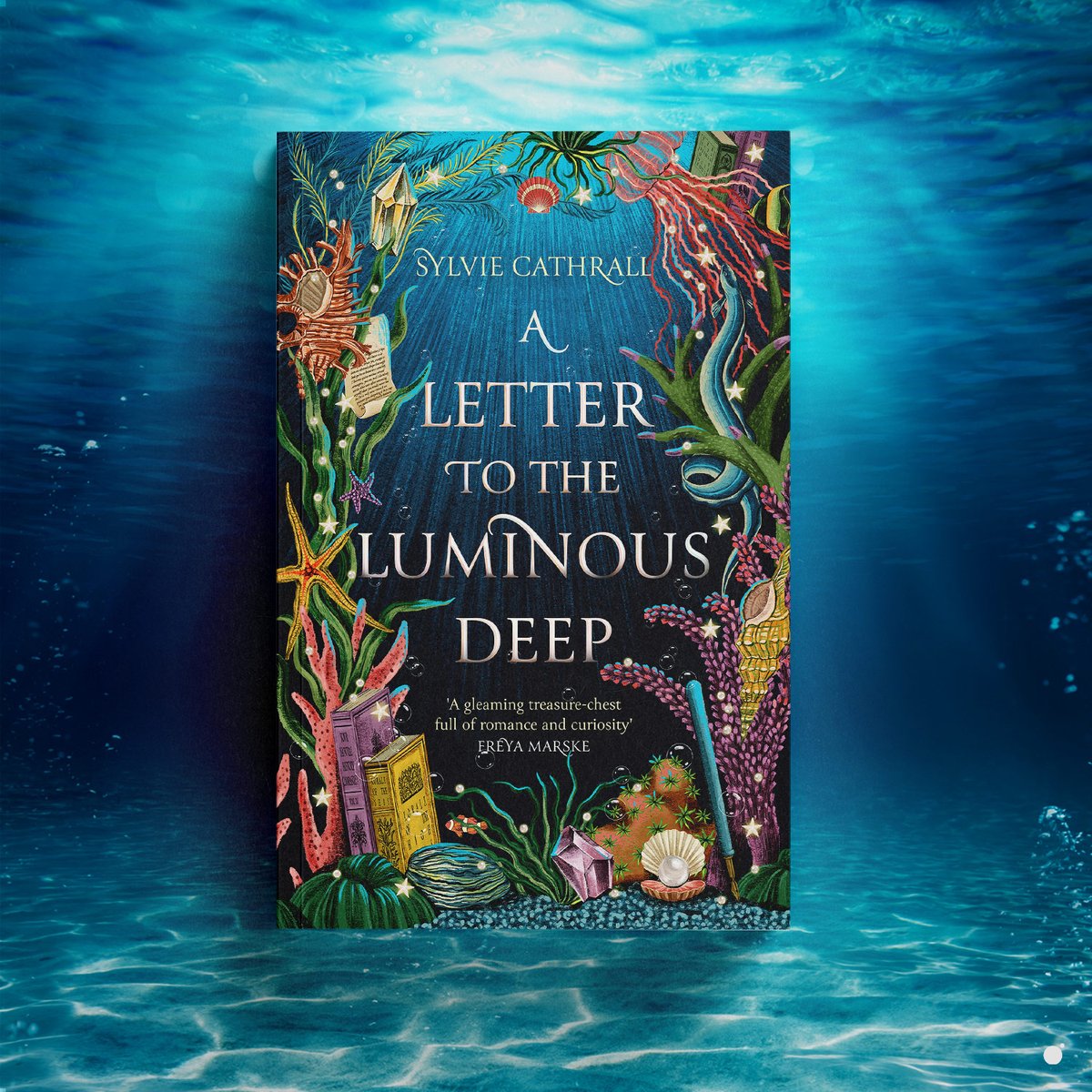 Cover launch! We are pleased to present @SylvieCathrall’s debut A LETTER TO THE LUMINOUS DEEP, a cosy underwater fantasy with magical academia and pen-pal romance arriving in 2024. Learn more: bit.ly/45LG2iw Design by Charlotte Stroomer Illustration by Raxenne Maniquiz