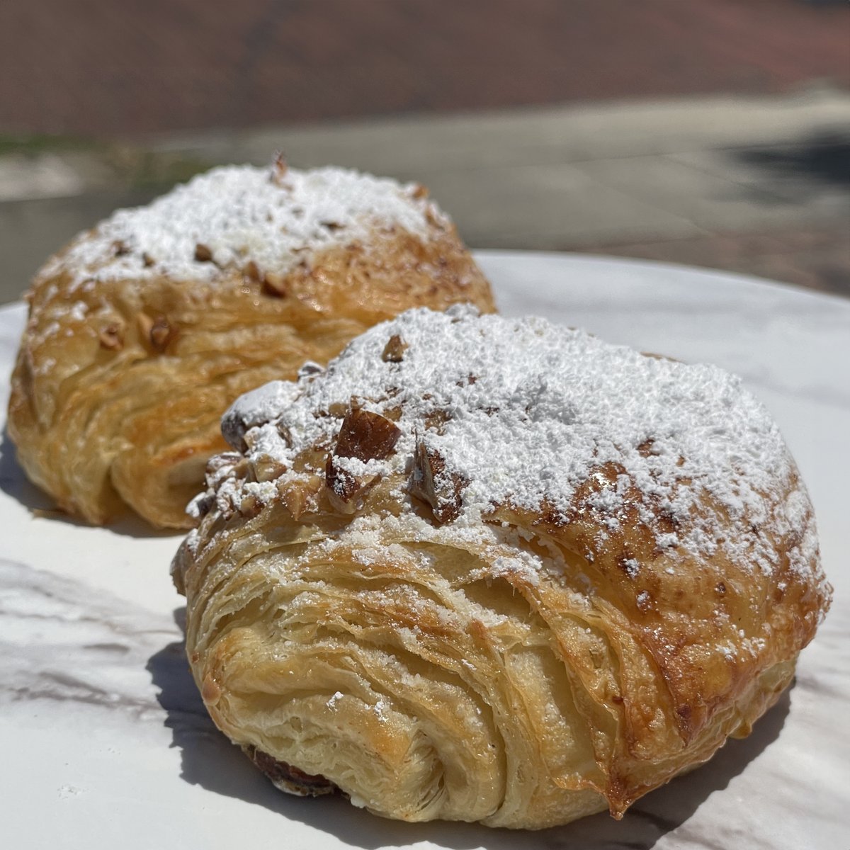 OldeHearthBread's tweet photo. Today is National Doughnut Day, but we don’t fry - so enjoy our baked bear claw! Our first pastry chef never added the little toe cuts, so it became our thing. If you miss the notches, think of it as an almond croissant!
#nationaldoughnutday #nationaldonutday #bearclaw #pastries https://t.co/CbWpIJJmsn