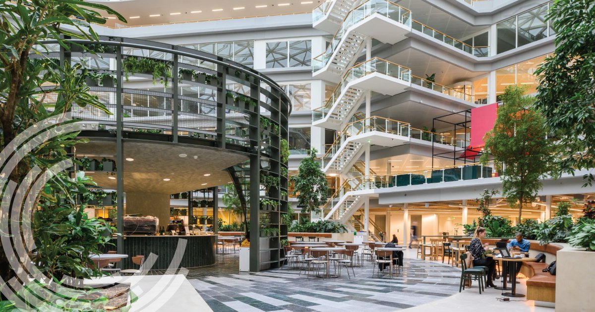 WELLcertified's tweet photo. We're excited to highlight EDGE as this week's #WELLFridayFeature. EDGE's Amsterdam West location aims to be remarkably healthy and sustainable. The glass atrium combines natural light, biophilia and spaces for restorative breaks. More about EDGE: https://t.co/RXPSjSyTn2 https://t.co/rGweRYHjr1