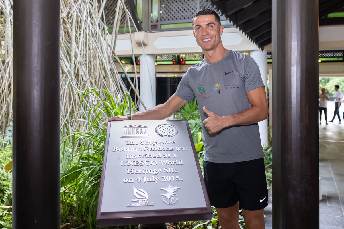 Cristiano's tweet photo. The world's only tropical garden to be honoured as a UNESCO World Heritage Site is found in Singapore. There I visited my friend's NParks - Peter Lim tree. And met the beneficiaries of the NParks - Peter Lim Scholarship. Thank you for your love and support! Don't forget keep learning and #BeSIUPER"