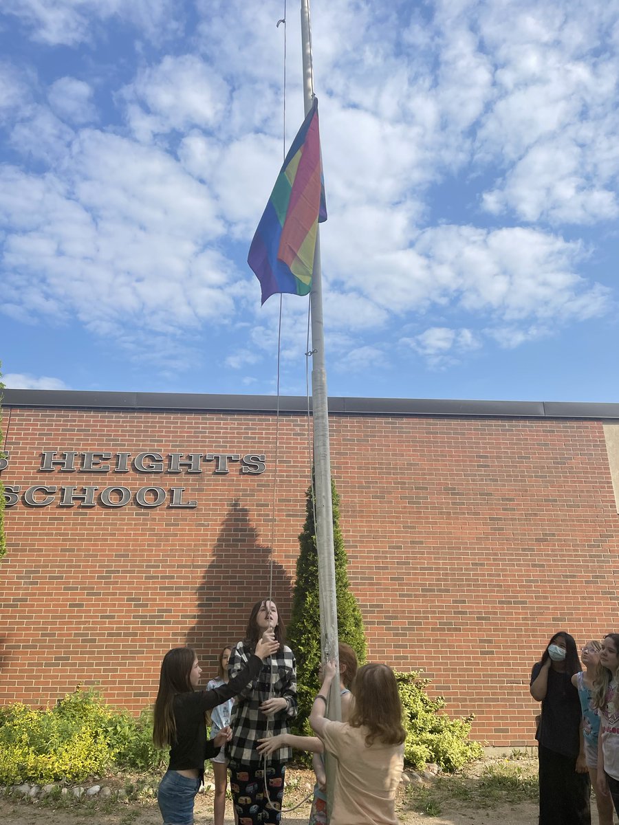 Raising the Progressive Pride Flag at Cundles.