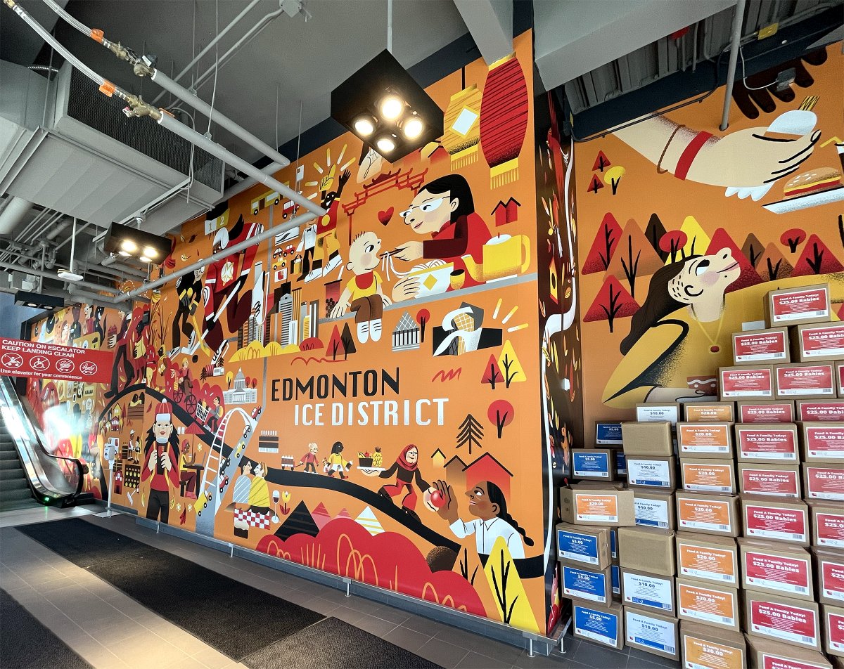 Finally went to see my mural at Loblaws City Market - Ice District! This mural is about community care and is inspired by the love that I see in central Edmonton - sharing food, mutual aid, and community partnerships. ❤️ #yegarts #yegmural #yegartist #mural