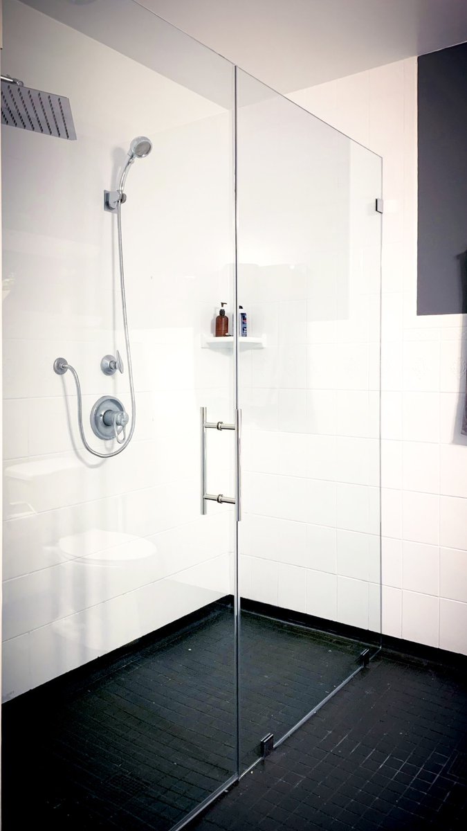 Step into a world of elegance with our Frameless Hinged Shower Doors. #BathroomDesign #HomeImprovement #InteriorDesign #ModernBathrooms #HingedShowerDoors #BathroomUpgrade #HomeStyle