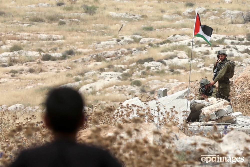 Israeli soldiers keep watch during clashes with Palestinian protesters following a demonstration against the Israeli settlements expansion in the Beit Dajan village area, near the West Bank city of Nablus, 02 June 2023.

📸 EPA / Alaa Badarneh

#epaimages