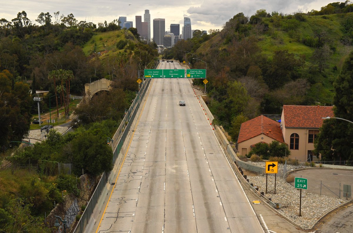 A photo of an empty 101 freeway sans one lonely car sharing the dream of a congestion-free Los Angeles.