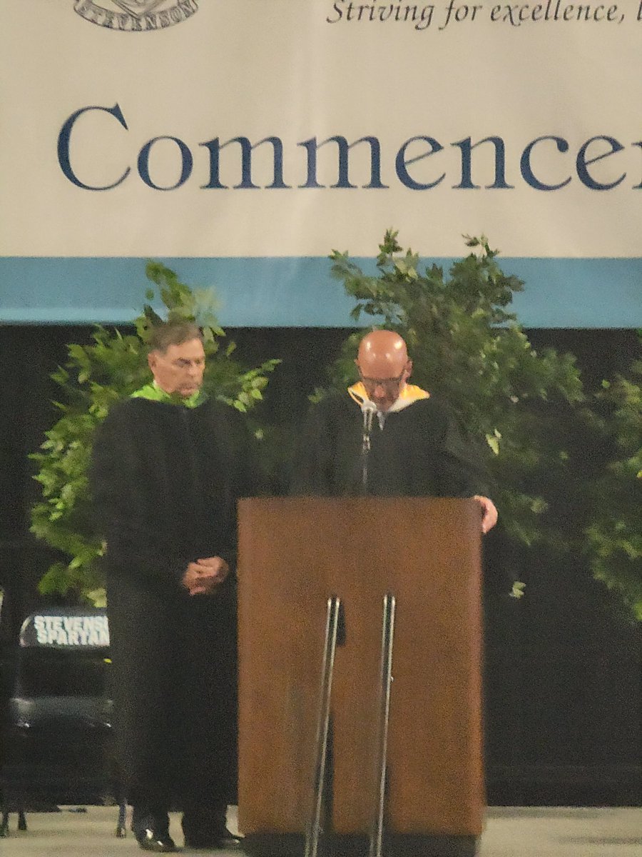 As principal, Mr. Mazzoni presents the Class of 2023 to Livonia Public Schools School Board President Mark Johnson as successfully having completed the graduation requirements and eligible for their diplomas.