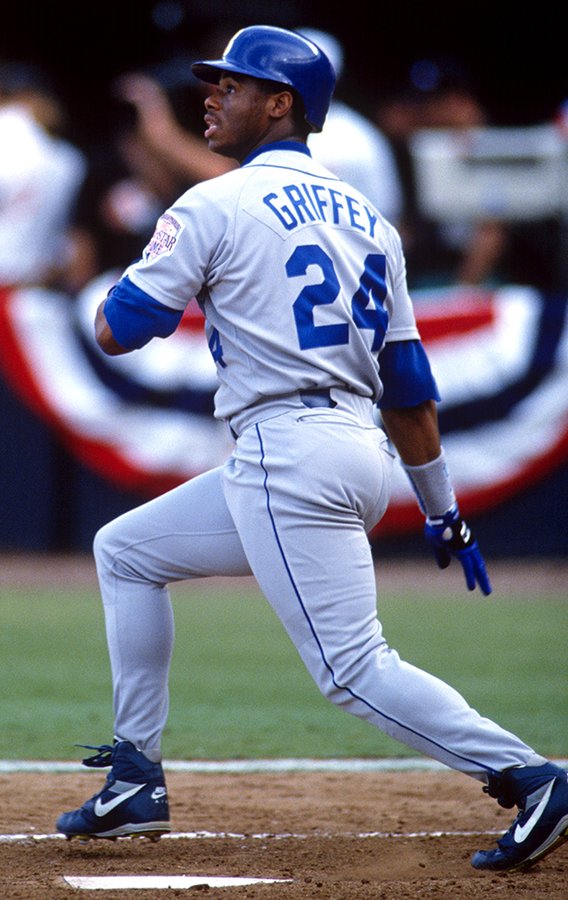 Ken Griffey Jr. swinging bat in Mariners uniform