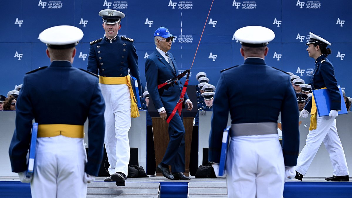 TheOnion's tweet photo. Biden Airlifted To Standing Position https://t.co/YiA9MQvtTW https://t.co/cJIReatHz3