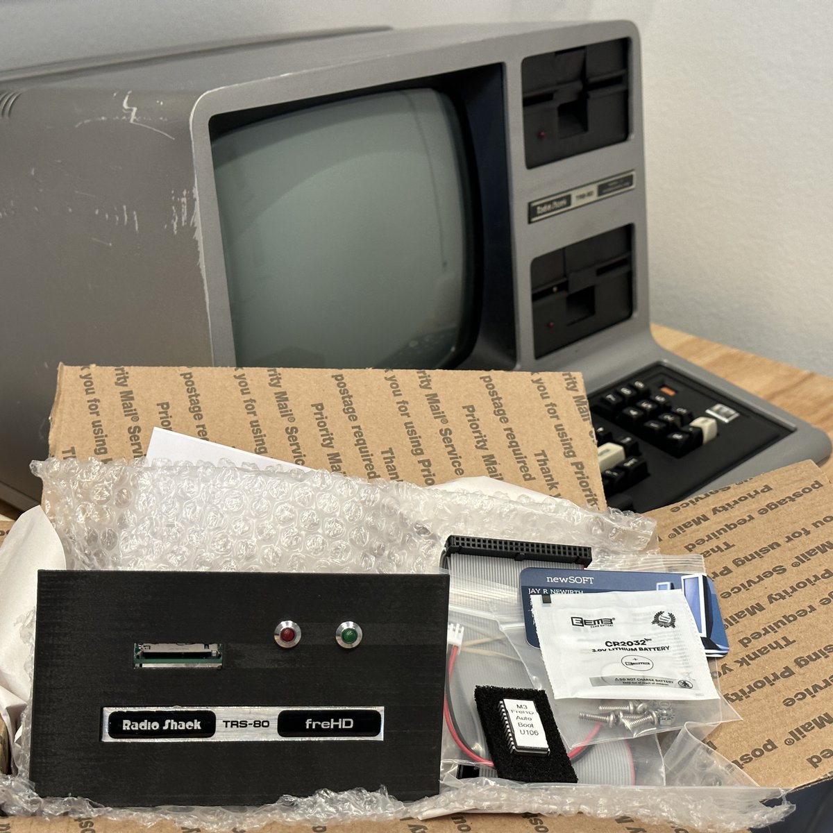 thevintnerd's tweet image. This Just In... SD Card Reader for the TRS-80 Model III. Will look cool in the upper drive bay! :)

#freHD #newSOFT #SDCard #Tandy #RadioShack #TRS80 #ModelIII #VintageComputing #RetroComputers #RetroGaming #WallOfRetro #NerdsOfVintage #HappyNerding #TheVintNerd