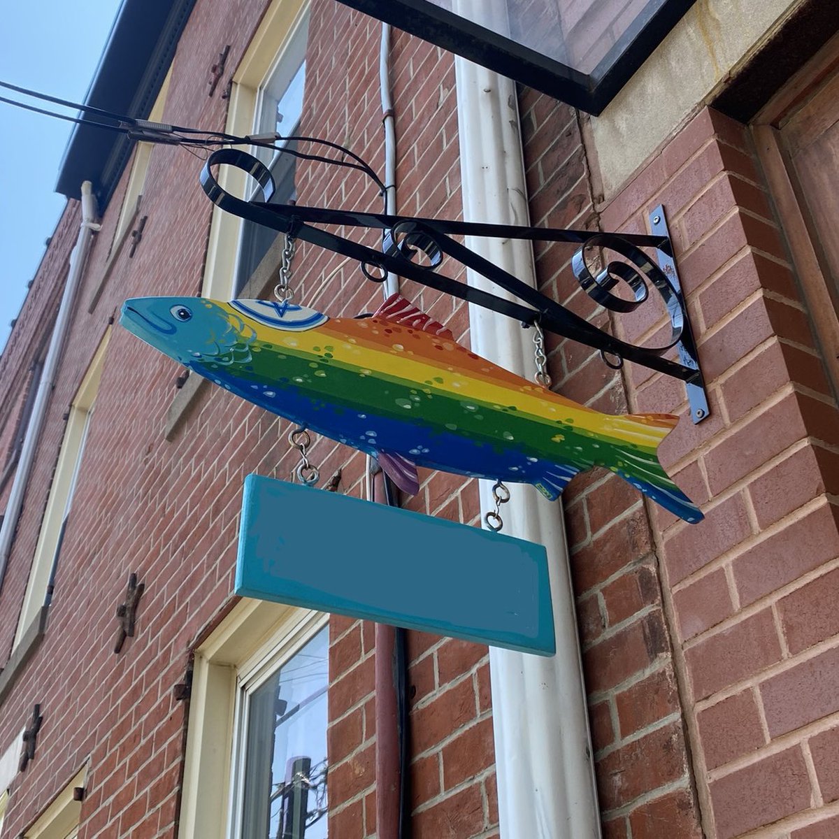 Low-key obsessed with the gay, Jewish, Fishtown sign in my neighborhood.