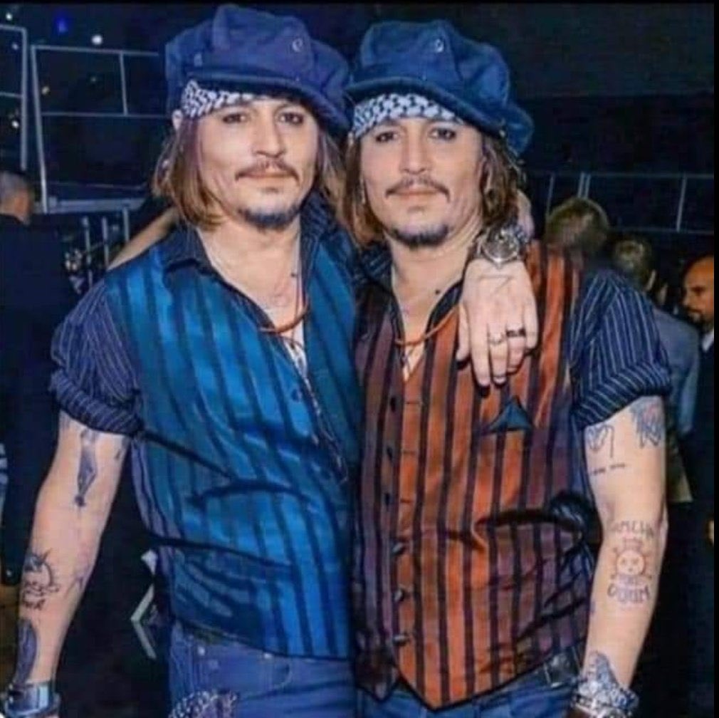 Johnny Depp with his clone. Many of the high paying actors had clones.