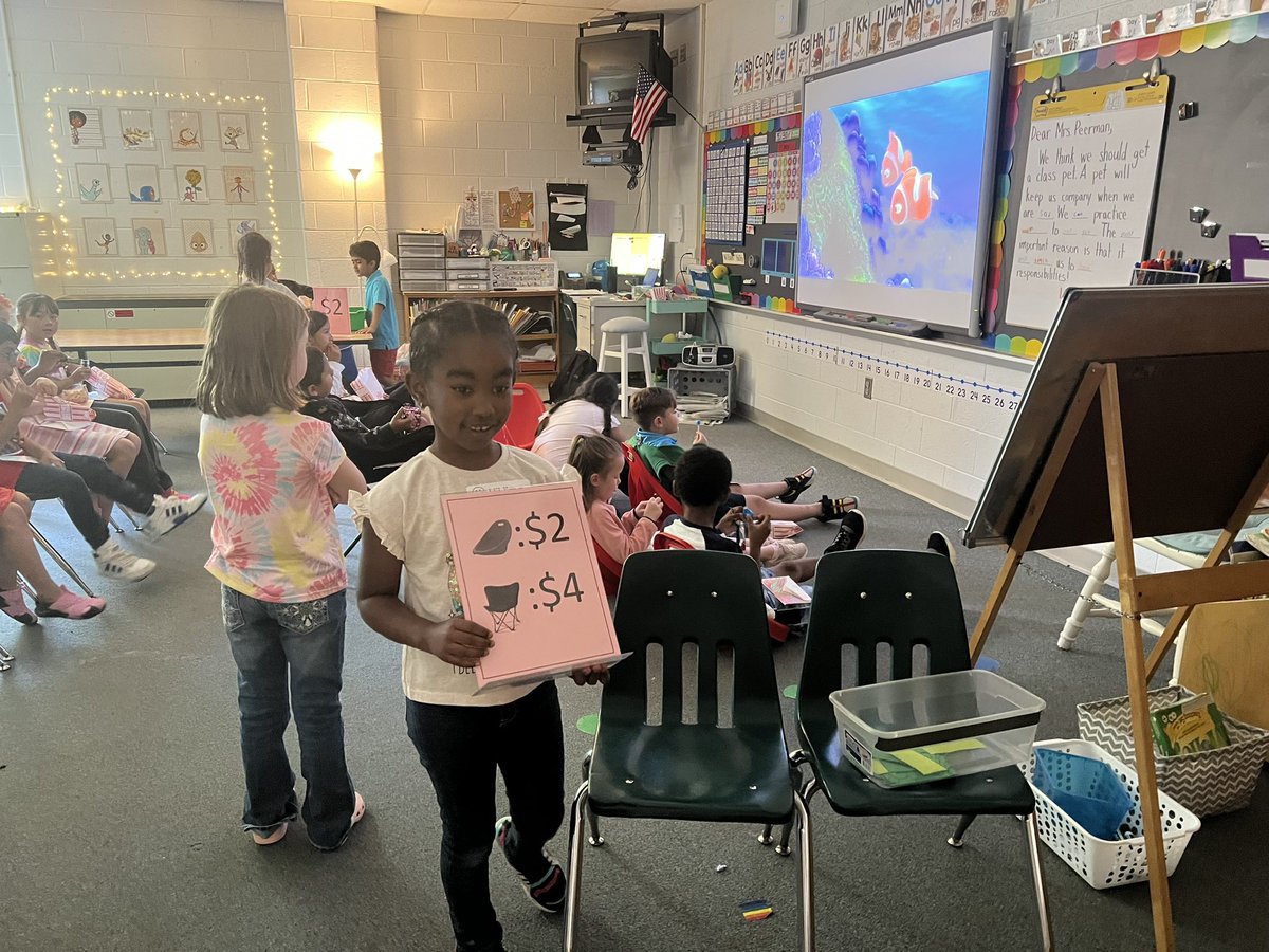 magical_msa's tweet photo. KidsTown was in full swing @halley_es as first graders wrap up their economics unit ! 🤑 Our students were producers and consumers who provided and purchased goods and services at our “stores”! 💵🛍️ Check out the fun we’ve had the last two days! 🤩 https://t.co/3DcdOrmilI