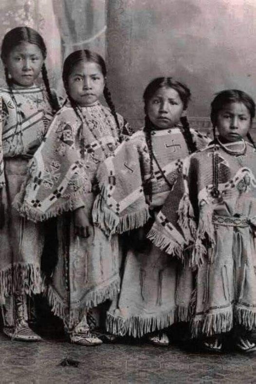 Four little Native American girls.