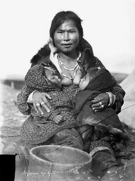 Inuit woman nursing her twins
Alaska
early 1900s