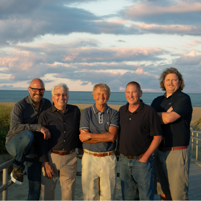 More than sixty years ago, a man set out with a vision. He saw the world in metes and bounds, and used his insights into the physical layout of our earth to single handedly start what has grown into a full service multi-disciplined design firm. That man, Wilfred P. Large, stuck w