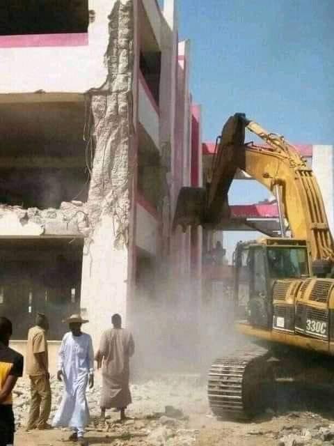 The first Picture is Shahuci Ultra Modern Motor park that the administration of Sen. Kwankwaso spent millions of naira to construct for the benefit of Kano traders around there. The building was demolished by Gandollar and sold to his son.