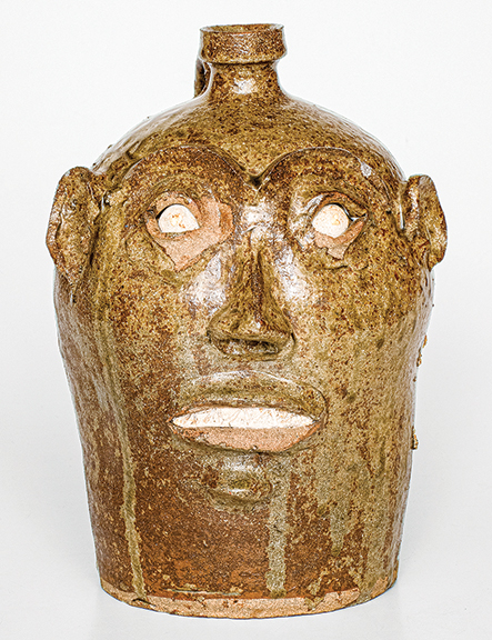 AntiqueDigest's tweet photo. Large (10¾") stoneware face jug with alkaline glaze, Edgefield District, South Carolina, 1850-80, possibly by Fortune Justice, sold for $144,000 (est. $35,000/50,000) at @CrockerFarm https://t.co/o9igiyKzi4 #antiques #antique #vintage #folkart #stoneware #Americana #facejug https://t.co/nhZX5pNlvI