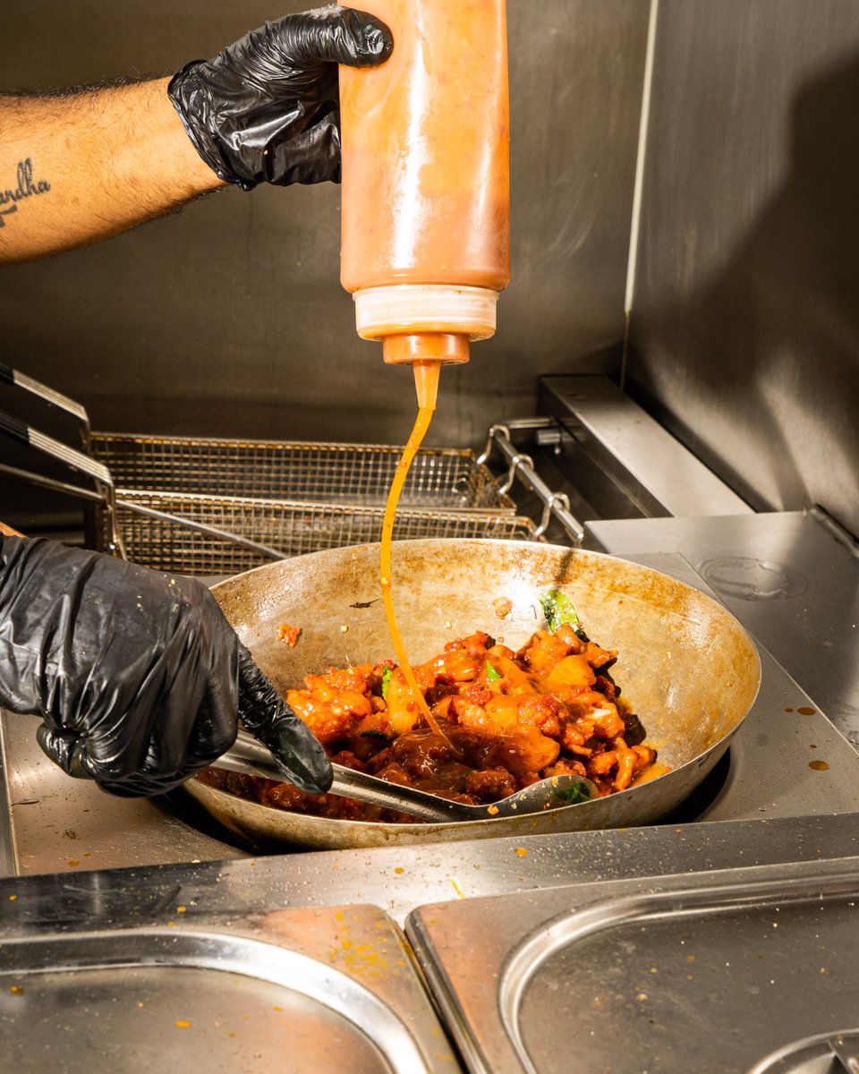 Chicken 65. So many theories about it's origins. At Curry On Naanstop we toss crispy fried chicken in our chef's secret sauce before finishing off with fried curry leaves.