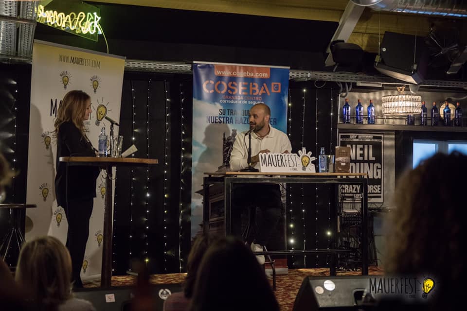 MauerFest's tweet photo. Presentación en @MauerFest de "Costo", de @andros_lozano , editado por @librosdelko . El autor fue presentado por @sundaymart y conversó con la periodista @YenaliaHV https://t.co/Cox2tCFVP8