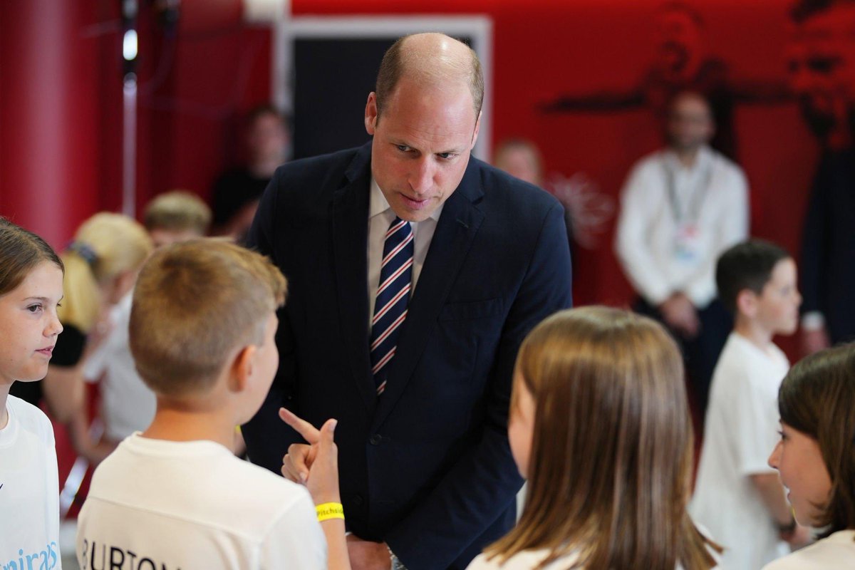 Prince William talking to young mascots prior to the Emirates FA Cup Final game.