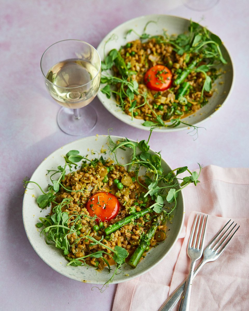 Pearl barley and British asparagus risotto topped with a cured @clarence_court egg yolk – dreamy! Head to the Clarence Court website for the full recipe. Credit to @davidloftus for the gorgeous shot.