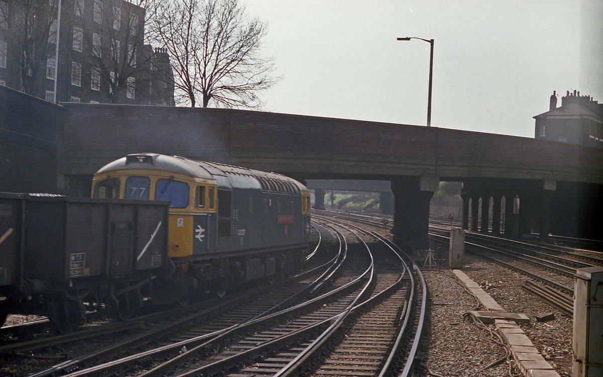 Crompton of the week.  33027 is in charge of the troublesome trucks at Clapham Jc on 9th April 1981.  #class33 #BRblue #Britishrail