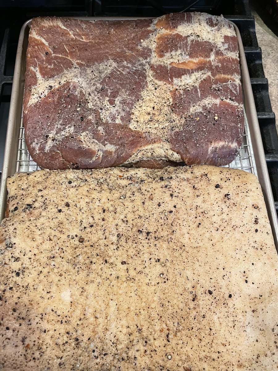 GunthorTM's tweet photo. After a morning walk with my Mom and Daisy I put pork belly on my @BigGreenEgg using @SteveRaichlen made from scratch bacon recipe from Project Smoke on half the other I used the recipe and added more pepper & seasonins #bge #bgenation #projectsmoke https://t.co/mtqBMZNnWL